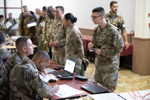 U.S. Army Spc. Vinglas check in as the French Armed Forces in New Caledonia host the opening ceremony for Exercise Croix du Sud at Les Artifices, a military facility in Noumea, April 21, 2025. The biennial field training exercise, now in its 11th...