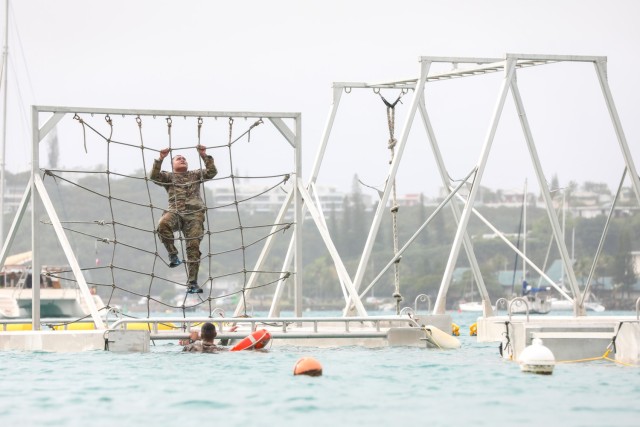 U.S. Army Soldier Jake Alafanso, 1st Platoon, 368th Military Police Company, and members of the French Armed Forces navigate a deep-water obstacle course during Exercise Croix du Sud 2025, April 24, 2025, off the coast of Nouméa, New Caledonia....
