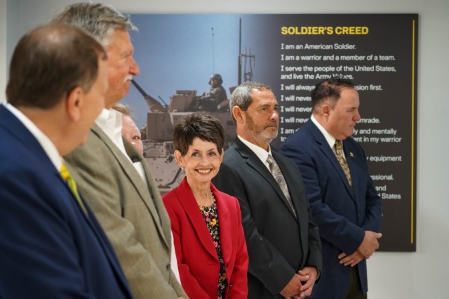 The six TACOM Hall of Fame Class of 2024 inductees gather for a plaque unveiling during the April 29, 2025, Hall of Fame grand opening and induction ceremony at the Detroit Arsenal.