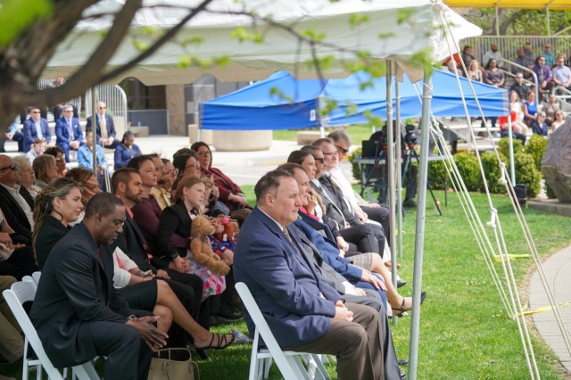 Members of the TACOM Hall of Fame Class of 2024 and their invited guests listen during the April 29, 2025, Hall of Fame induction ceremony at the Detroit Arsenal.