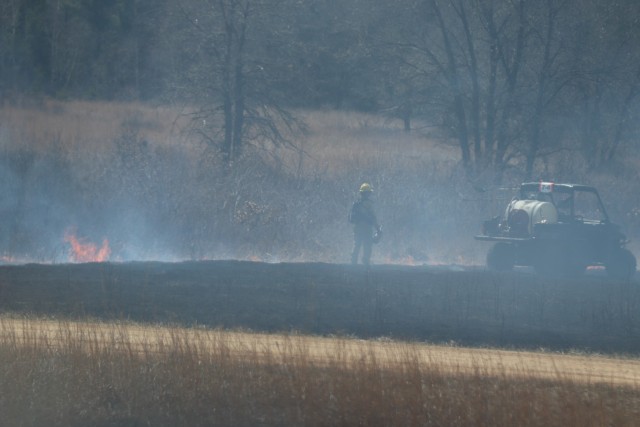 Members of the Fort McCoy prescribed burn team oversee a prescribed burn April 23, 2025, on Badger Drop Zone on South Post at Fort McCoy, Wis. The post prescribed burn team includes personnel with the Fort McCoy Directorate of Emergency Services...