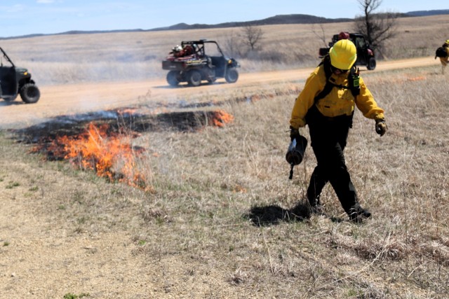 Members of the Fort McCoy prescribed burn team oversee a prescribed burn April 23, 2025, on Badger Drop Zone on South Post at Fort McCoy, Wis. The post prescribed burn team includes personnel with the Fort McCoy Directorate of Emergency Services...