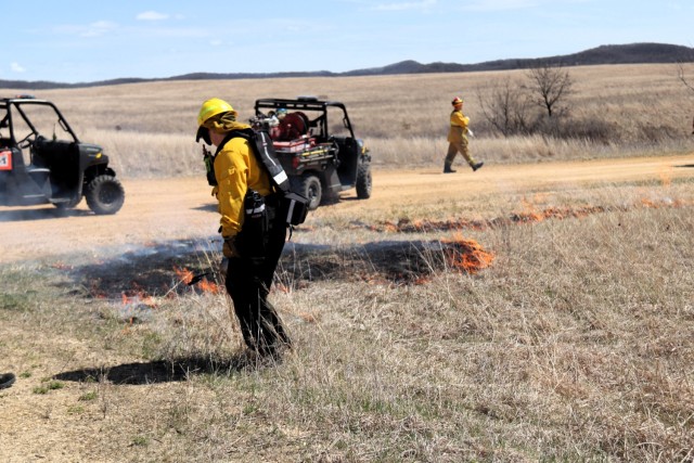 Members of the Fort McCoy prescribed burn team oversee a prescribed burn April 23, 2025, on Badger Drop Zone on South Post at Fort McCoy, Wis. The post prescribed burn team includes personnel with the Fort McCoy Directorate of Emergency Services...