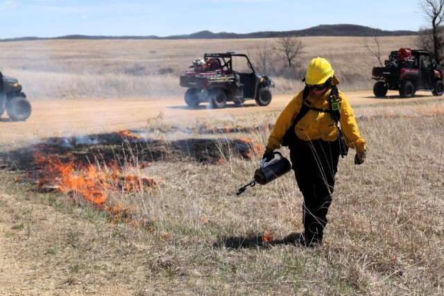 Members of the Fort McCoy prescribed burn team oversee a prescribed burn April 23, 2025, on Badger Drop Zone on South Post at Fort McCoy, Wis. The post prescribed burn team includes personnel with the Fort McCoy Directorate of Emergency Services...