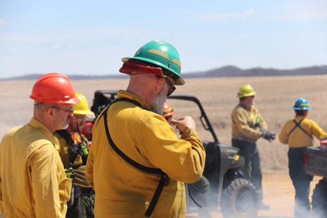 Members of the Fort McCoy prescribed burn team oversee a prescribed burn April 23, 2025, on Badger Drop Zone on South Post at Fort McCoy, Wis. The post prescribed burn team includes personnel with the Fort McCoy Directorate of Emergency Services...
