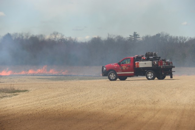 Members of the Fort McCoy prescribed burn team oversee a prescribed burn April 23, 2025, on Badger Drop Zone on South Post at Fort McCoy, Wis. The post prescribed burn team includes personnel with the Fort McCoy Directorate of Emergency Services...