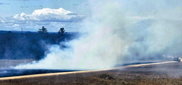 Members of the Fort McCoy prescribed burn team oversee a prescribed burn April 23, 2025, on Badger Drop Zone on South Post at Fort McCoy, Wis. The post prescribed burn team includes personnel with the Fort McCoy Directorate of Emergency Services...