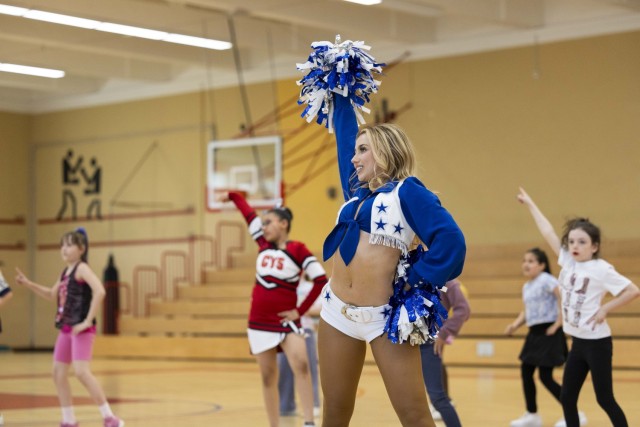 Dallas Cowboys Cheerleaders visit USAG Rheinland-Pfalz to celebrate Month of the Military Child