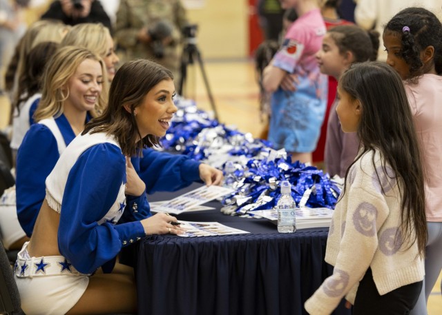 Dallas Cowboys Cheerleaders visit USAG Rheinland-Pfalz to celebrate Month of the Military Child