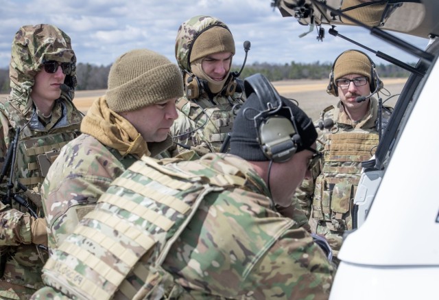 Students and staff with the Air Force’s Air Mobility Liaison Officer (AMLO) Qualification Course complete training April 15, 2025 at Young Air Assault Strip on South Post at Fort McCoy, Wis. Lt. Col. Andrew Baker, course director with the 435th...