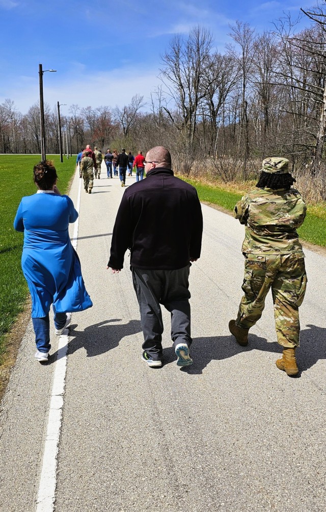 Fort McCoy personnel participate in the Denim Day 2-mile Walk on April 30, 2025, held at the Fort McCoy, Wis., Physical Fitness Training Site where there’s a ½-mile track. More than two dozen people participated in the walk. Denim Day is...