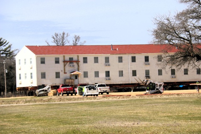 A fourth barracks building from the 1600 block at Fort McCoy, Wis., is shown being moved April 16, 2025, from the 1600 block to another area of the installation. These buildings will eventually be reset at another area of the post so new...