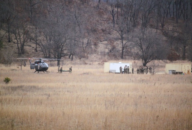 Personnel with the 1st Battalion, 147th Aviation Regiment of the Wisconsin National Guard conduct hot and cold patient load training April 11, 2025, during drill training at Fort McCoy, Wis. From April 11-13, 2025, Soldiers with the 1st Battalion,...