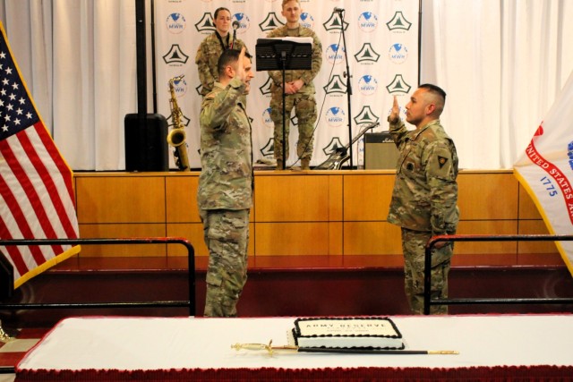 Fort McCoy Deputy Garrison Commander Lt. Col. Mike Corkum leads a reenlistment ceremony for a Soldier during the 2025 observance of the Army Reserve birthday April 23, 2025, at McCoy’s Community Center at Fort McCoy, Wis. Fort McCoy celebrated...