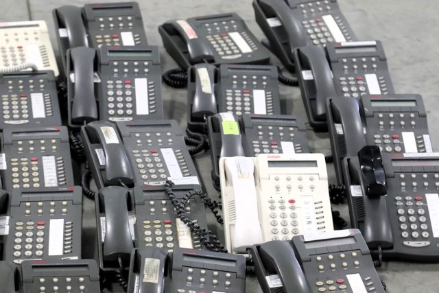Old desk phones are shown Jan. 17, 2025, in a building at Fort McCoy, Wis. The old phones were collected by the Fort McCoy Garrison Information Management Office after the installation completed a telecommunications switch from Time Division...