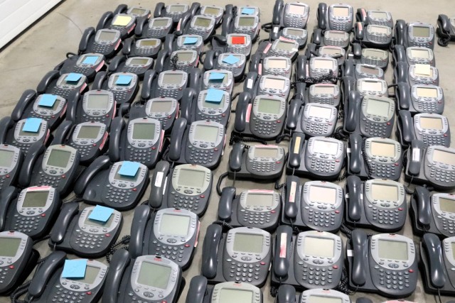 Old desk phones are shown Jan. 17, 2025, in a building at Fort McCoy, Wis. The old phones were collected by the Fort McCoy Garrison Information Management Office after the installation completed a telecommunications switch from Time Division...