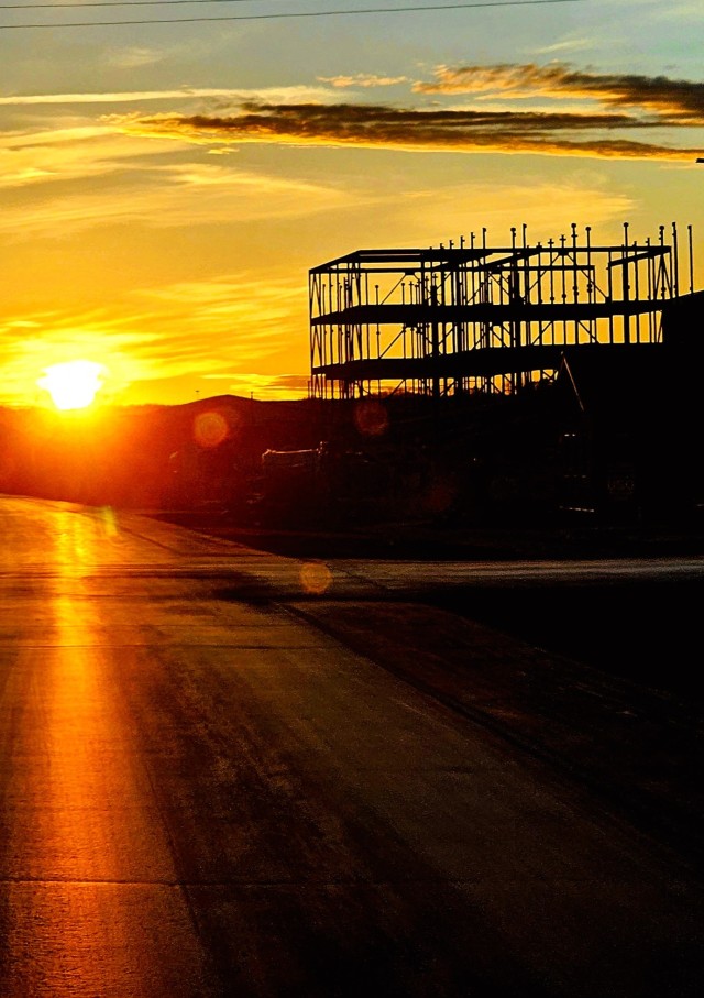 The construction area for a new $28.08 million barracks building is shown March 6, 2024, at sunset at Fort McCoy, Wis., as framing of the building continues to takes place. The contractor for the project, BlindermanPower (Construction), received...