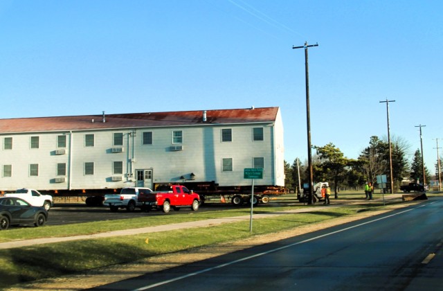 A barracks building from the 1600 block at Fort McCoy, Wis., is shown being moved April 16, 2025, from the 1600 block to another area of the installation. Contractors are moving several buildings in 2025. These buildings will eventually be reset...