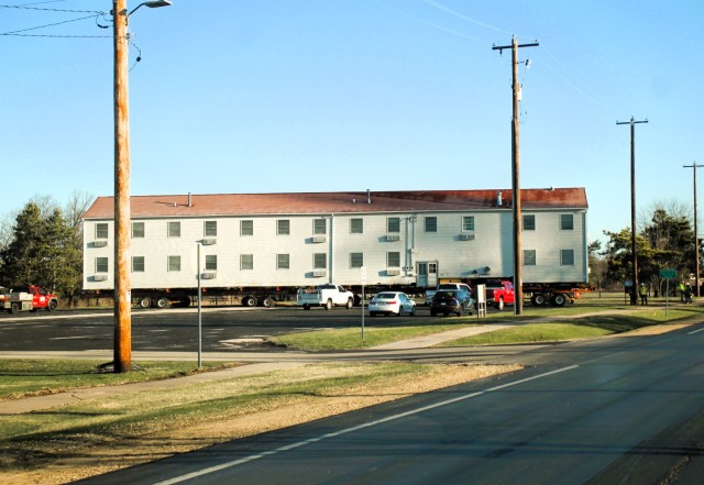 A fourth barracks building from the 1600 block at Fort McCoy, Wis., is shown being moved April 16, 2025, from the 1600 block to another area of the installation. These buildings will eventually be reset at another area of the post so new...