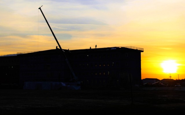 An area of the 1600 block of the cantonment area of the installation is shown Dec. 10, 2020, at sunset as a new multi-million dollar barracks is being built at Fort McCoy, Wis. Contractor L.S. Black Constructors was awarded a $20.6 million...