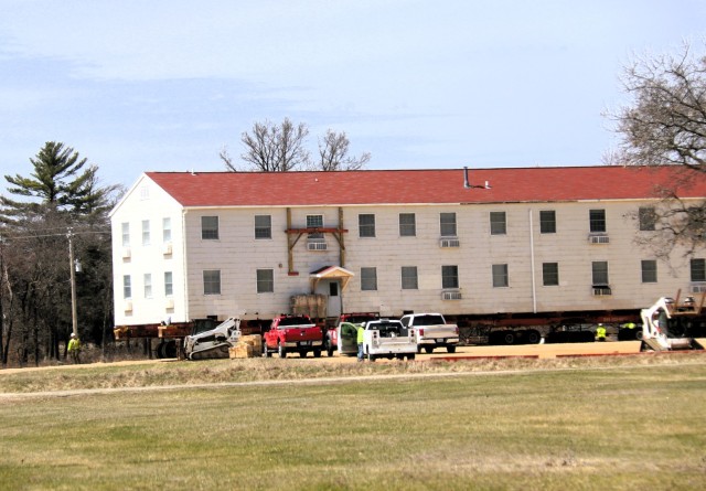A fourth barracks building from the 1600 block at Fort McCoy, Wis., is shown being moved April 16, 2025, from the 1600 block to another area of the installation. These buildings will eventually be reset at another area of the post so new...