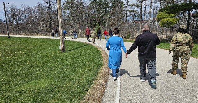 Fort McCoy personnel participate in the Denim Day 2-mile Walk on April 30, 2025, held at the Fort McCoy, Wis., Physical Fitness Training Site where there’s a ½-mile track. More than two dozen people participated in the walk. Denim Day is...