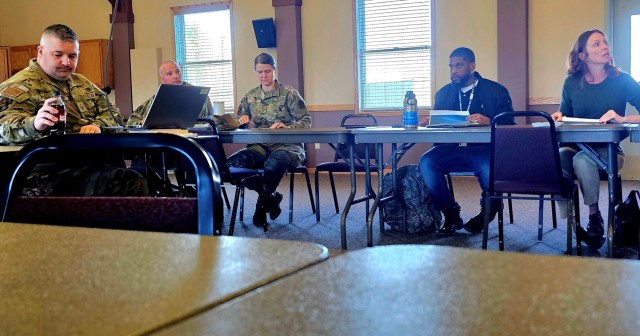 Leaders and staff from Fort McCoy, the Tomah VA Medical Center, and Volk Field, Wis., meet May 6, 2025, at Fort McCoy, Wis., to discuss medical readiness for service members, and more. The “Care Triad” as they are called meets regularly to...