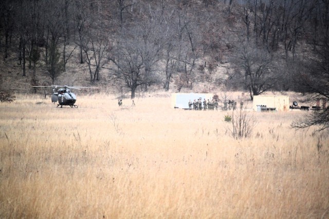 Personnel with the 1st Battalion, 147th Aviation Regiment of the Wisconsin National Guard conduct hot and cold patient load training April 11, 2025, during drill training at Fort McCoy, Wis. From April 11-13, 2025, Soldiers with the 1st Battalion,...