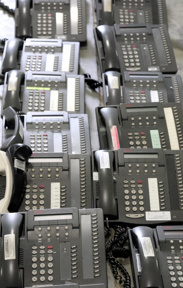 Old desk phones are shown Jan. 17, 2025, in a building at Fort McCoy, Wis. The old phones were collected by the Fort McCoy Garrison Information Management Office after the installation completed a telecommunications switch from Time Division...