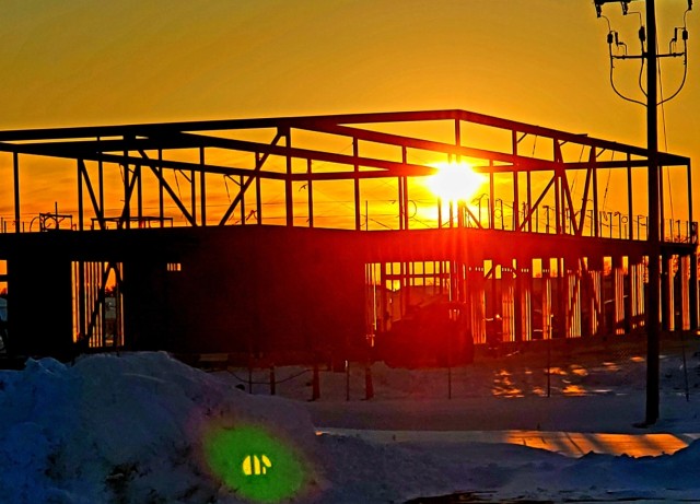 The construction area for a future transient training brigade headquarters in the 1600 block on the cantonment area is shown at sunset Jan. 30, 2023, at Fort McCoy, Wis. A contract, totaling $11,964,432.87, was awarded June 9, 2022, to L.S. Black...