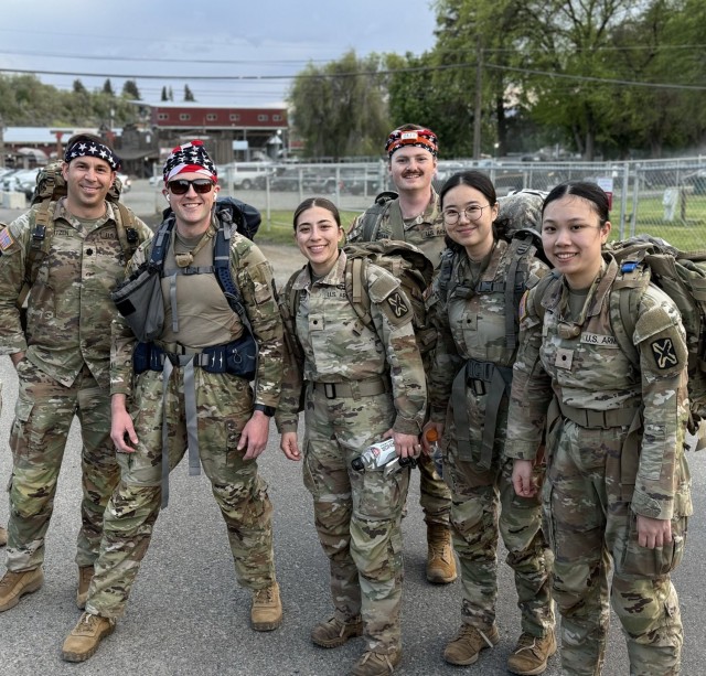 Soldiers from 341st Military Intelligence Battalion pose for a photo prior to the 5th annual Central Washington University Army Reserve Officer Training Corp. Norwegian Foot March in Ellensburg, Wash., May 2, 2025.
