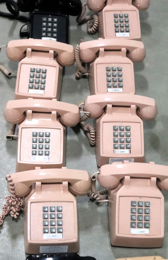 Old desk phones are shown Jan. 17, 2025, in a building at Fort McCoy, Wis. The old phones were collected by the Fort McCoy Garrison Information Management Office after the installation completed a telecommunications switch from Time Division...