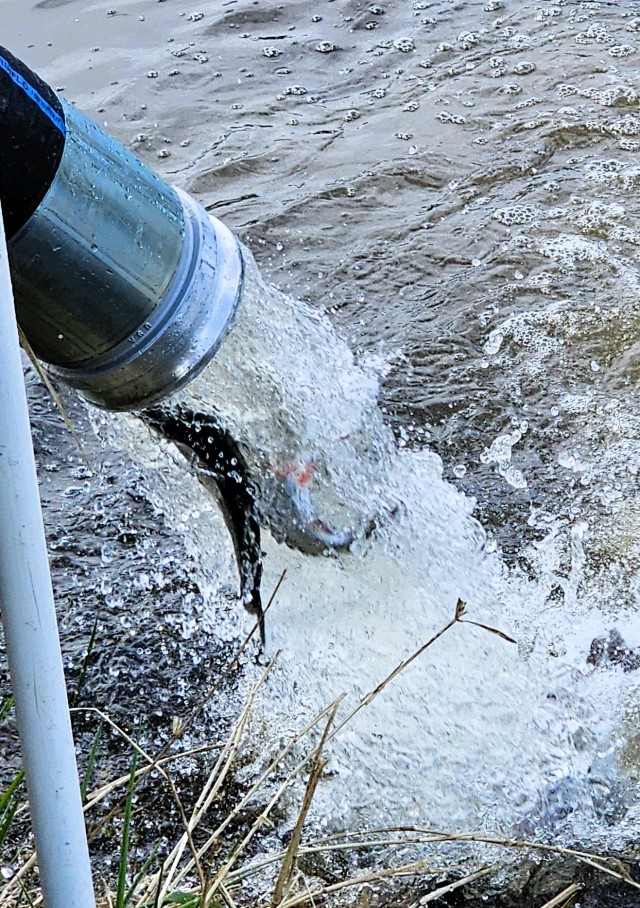 U.S. Fish and Wildlife Service (USFWS) employees stock rainbow trout April 23, 2025, in Suukjak Sep Lake on North Post at Fort McCoy, Wis. Approximately 15,000 rainbow trout were stocked at several lakes and ponds at Fort McCoy by the USFWS Genoa...