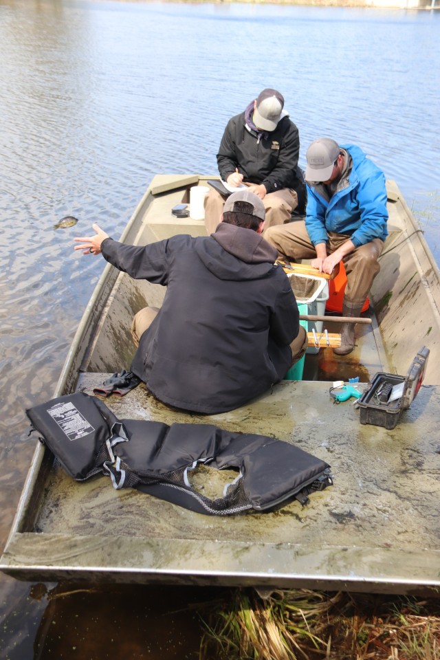 Watershed Management Biologist Derek Maki and Watershed Management Specialists Jaden Gallardo and Trenton Foreman with Colorado State University conduct a fish survey April 22, 2025, at Stillwell Lake on South Post at Fort McCoy, Wis. They...