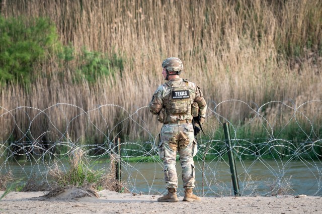 A U.S. Soldier with the Texas Army National Guard monitors activity along the Rio Grande during a patrol near Roma, Texas, April 25, 2025. Texas Army Guard members are part of Operation Lone Star, working alongside U.S. Border Patrol agents to...