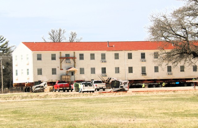 A fourth barracks building from the 1600 block at Fort McCoy, Wis., is shown being moved April 16, 2025, from the 1600 block to another area of the installation. These buildings will eventually be reset at another area of the post so new...