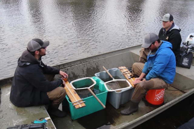 Watershed Management Biologist Derek Maki and Watershed Management Specialists Jaden Gallardo and Trenton Foreman with Colorado State University conduct a fish survey April 22, 2025, at Stillwell Lake on South Post at Fort McCoy, Wis. They...