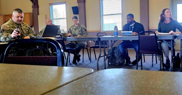 Leaders and staff from Fort McCoy, the Tomah VA Medical Center, and Volk Field, Wis., meet May 6, 2025, at Fort McCoy, Wis., to discuss medical readiness for service members, and more. The “Care Triad” as they are called meets regularly to...
