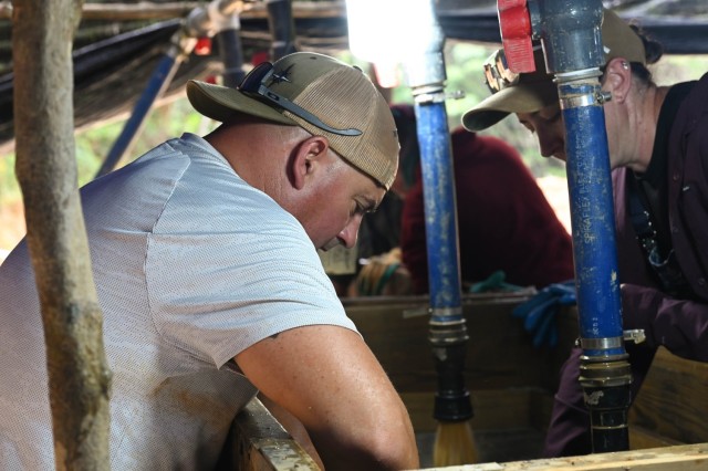 Oregon Army National Guard Sgt. 1st Class Nate Brushe, a recovery noncommissioned officer, wet-screens material during a Defense POW/MIA Accounting Agency (DPAA) recovery mission in Vietnam, April 11, 2025. The DPAA mission is to provide the...