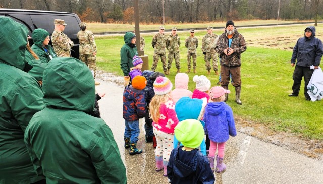Fort McCoy community members plant trees April 25, 2025, during a tree-planting event at Fort McCoy, Wis. Dozens of community members planted 500 trees on the installation cantonment to establish a tree break. The installation also received its...