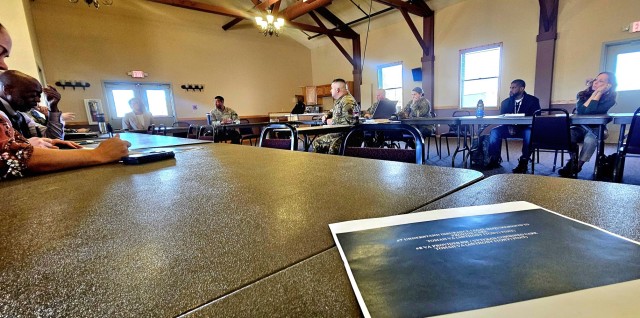 Leaders and staff from Fort McCoy, the Tomah VA Medical Center, and Volk Field, Wis., meet May 6, 2025, at Fort McCoy, Wis., to discuss medical readiness for service members, and more. The “Care Triad” as they are called meets regularly to...