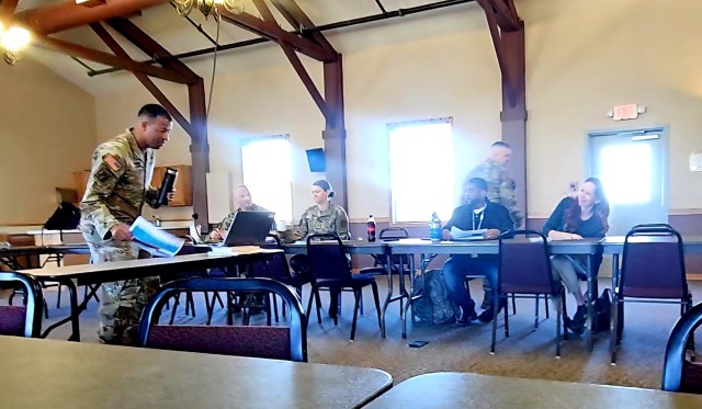 Leaders and staff from Fort McCoy, the Tomah VA Medical Center, and Volk Field, Wis., meet May 6, 2025, at Fort McCoy, Wis., to discuss medical readiness for service members, and more. The “Care Triad” as they are called meets regularly to...