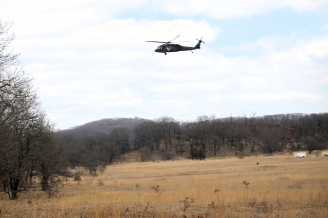 An aircrew with the 1st Battalion, 147th Aviation Regiment of the Wisconsin National Guard operates a UH-60 Black Hawk helicopter April 11, 2025, during drill training at Fort McCoy, Wis. From April 11-13, 2025, Soldiers with the 1st Battalion,...