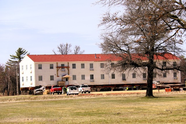 A fourth barracks building from the 1600 block at Fort McCoy, Wis., is shown being moved April 16, 2025, from the 1600 block to another area of the installation. These buildings will eventually be reset at another area of the post so new...