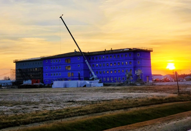 An area of the 1600 block of the cantonment area of the installation is shown Dec. 10, 2020, at sunset as a new multi-million dollar barracks is being built at Fort McCoy, Wis. Contractor L.S. Black Constructors was awarded a $20.6 million...