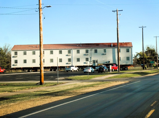 A fourth barracks building from the 1600 block at Fort McCoy, Wis., is shown being moved April 16, 2025, from the 1600 block to another area of the installation. These buildings will eventually be reset at another area of the post so new...