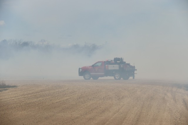 Members of the Fort McCoy prescribed burn team oversee a prescribed burn April 23, 2025, on Badger Drop Zone on South Post at Fort McCoy, Wis. The post prescribed burn team includes personnel with the Fort McCoy Directorate of Emergency Services...