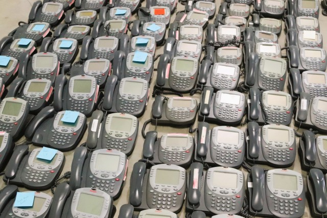 Old desk phones are shown Jan. 17, 2025, in a building at Fort McCoy, Wis. The old phones were collected by the Fort McCoy Garrison Information Management Office after the installation completed a telecommunications switch from Time Division...