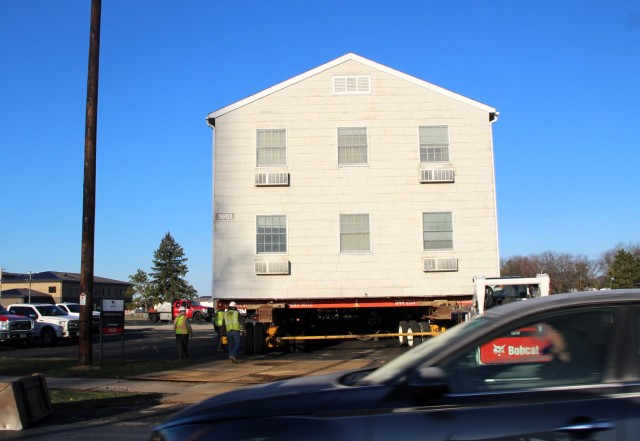 A fourth barracks building from the 1600 block at Fort McCoy, Wis., is shown being moved April 16, 2025, from the 1600 block to another area of the installation. These buildings will eventually be reset at another area of the post so new...