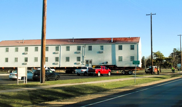 A fourth barracks building from the 1600 block at Fort McCoy, Wis., is shown being moved April 16, 2025, from the 1600 block to another area of the installation. These buildings will eventually be reset at another area of the post so new...